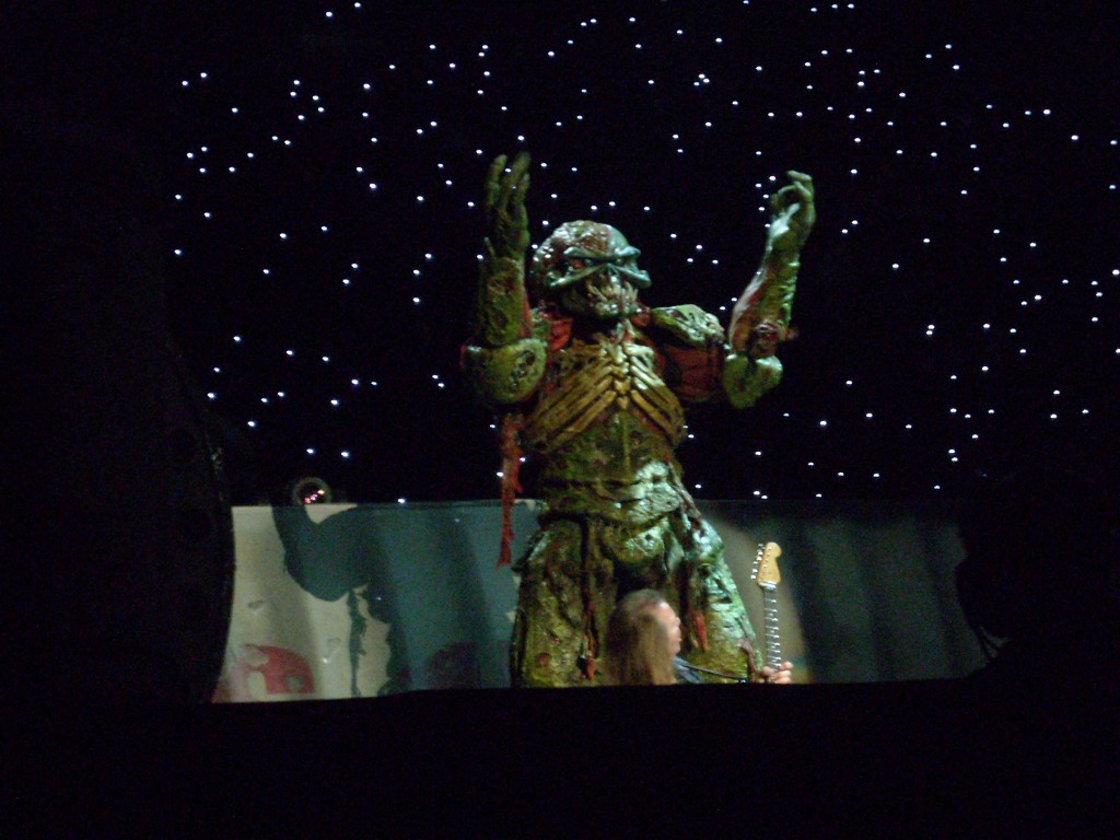 Eddie gestures to the crowd in Mexico City, while Murray kneels before him.